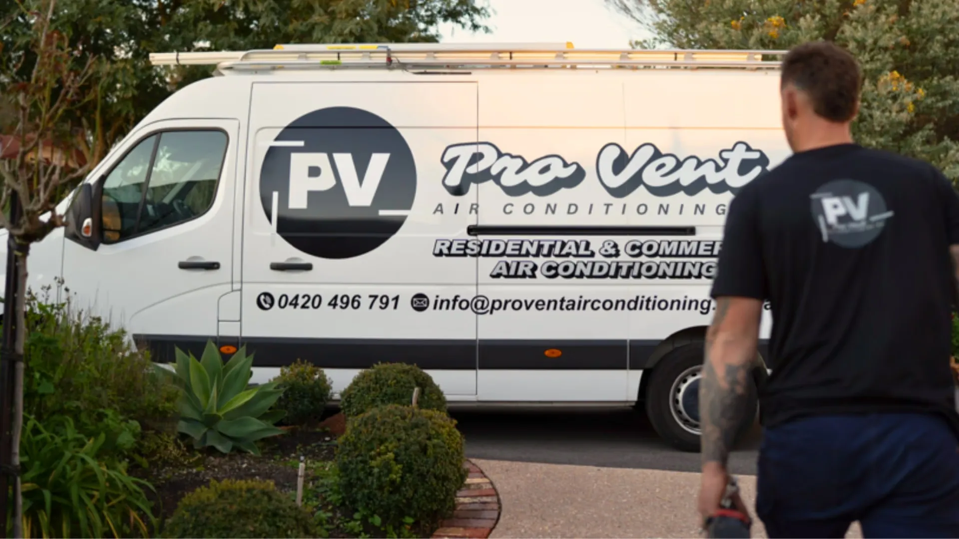 Pro Vent technician walking to the branded van outside a Perth home